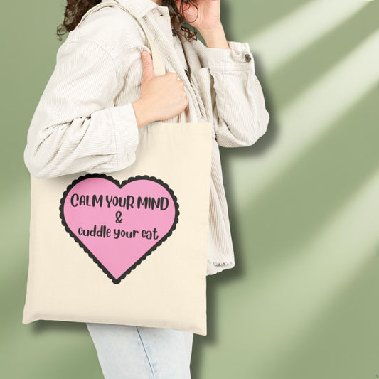 Canvas bag in pink with mindful quote for cat lovers on model